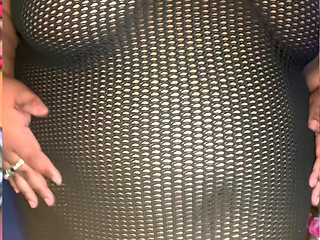 Net Dress Tease Short: Ebony SSBBW Shows off Curves in Net Dress