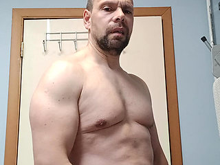 My muscular body turned me on too much, I ended up ejaculating in my hand