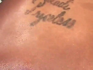 Megan Pryce an ebony slut with tattooed skin and brunette hair fucks with a bbc pounding her pussy