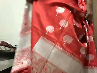Wear red saree in ghaghra style