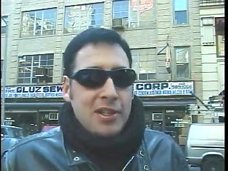 Hot dominatrix in leather with a great body puts a guy in clamps