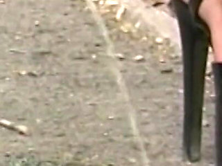 Yellow Pee Between High Heels