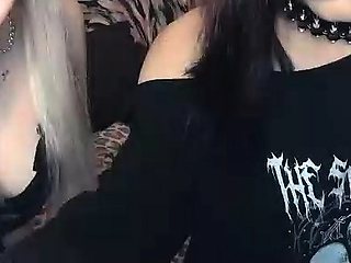 Pale blonde and tanned brunette lesbians toying and licking