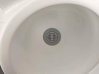 Moaning daddy has a lot of pressure and milks his cock in the public toilet