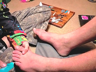 Praising her Masters' feet