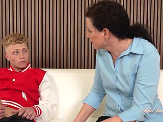 Mature Temptress's Sensual Charm Ignites in Timeless Passion