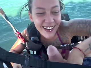 Amateur couple had oral sex while paragliding, and fucked on the beach after