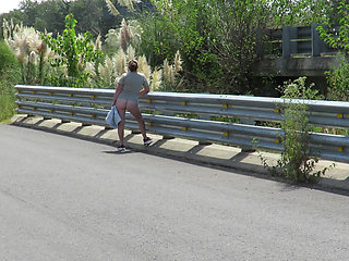 Patricia on the bridge over the road