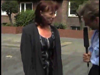 Blonde milf giving an interview