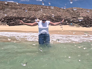 Girl Wetting Jeans in the Ocean and Swimming in Wet White T-shirt