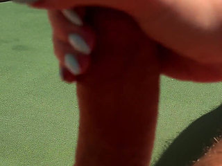 Hot Babe Gives Fast and Sloppy Handjob on the Terrace Over the Ocean