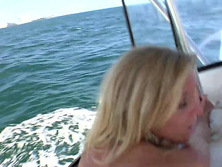 Blonde teen sucks avidly a hard cock