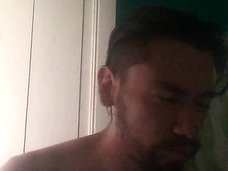 Man does his skincare in the morning