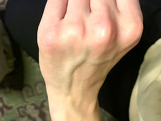 Veiny Hands Near the Heater