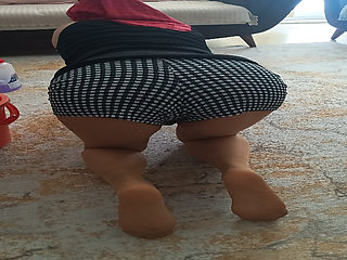 My big-buttocked, turbaned stepmother while cleaning