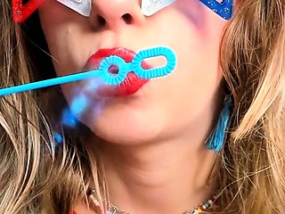 Petite Mercy - Poppy Red Lipstick Blowing Bubbles