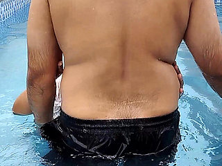 A Hot Couple's Risky Fun in the Swimming Pool.