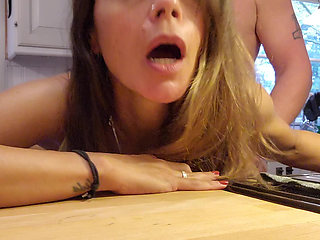 Hot milf gets fucked from behind in the kitchen hur husband did not know she had her camera on.