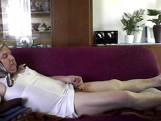 Andreas Jerks off with a Headscarf and Underskirt