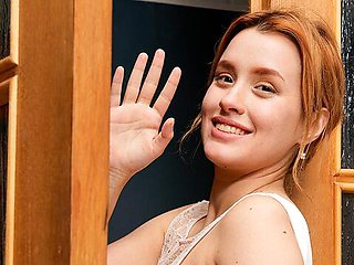 Sexy redhead girlfriend Angel Jolie stimulates her wet shaved pussy