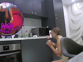 Hot tattooed blonde long hair beauty in the kitchen takes her panties off to show her meaty pussy and sexy ass