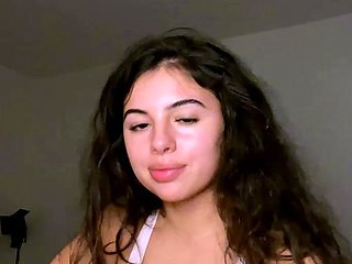Amateur young brunette enjoys dildo on solo masturbation