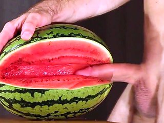 Muscular Stud Fucks and Cums on Watermelon
