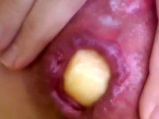 Anal insertion with a cute apple