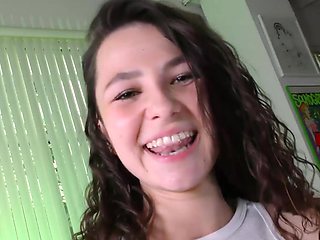 Chubby brunette Liz Jordan smiling in a POV video