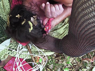 Young sadist whips an old pig tied up in the woods