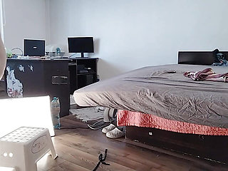 The sexy mom likes to try on clothes and cut them.