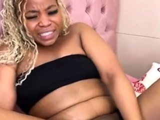 Dorothy Black and Britney use the toy