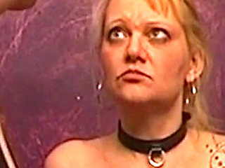 Tattooed Blonde MILF Endures Dungeon Spanking Session