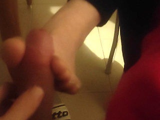 Soft feet teasing cock