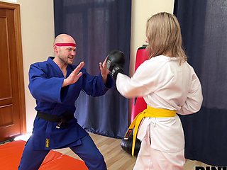 Sporty girl has sex with her boyfriend in the gym