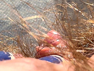 Amateur Hairy Girl Mastubates in Closeup with Huge Clit