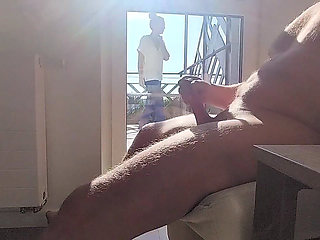 Dickflash in a Hotel Where a Maid Comes Through the Balcony and Gets Cum on Her Tits
