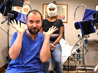 Exam room, nitrile gloves, manacled