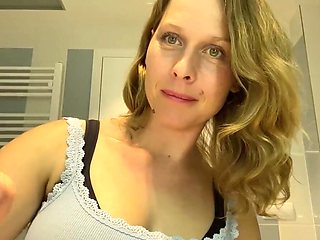 Ugly mom fondles her boobs while putting her make up on