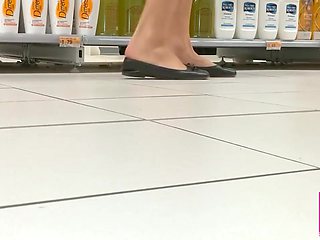 Footplay and Dipping in Black Flats at a Conad Shop