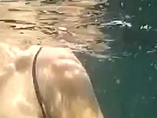 Swimming and Flashing in the Sea