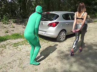 Suited slave gets punished outdoor from femdom chick