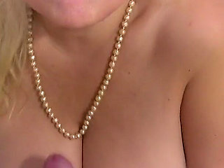 Busty Cougar Milking Cum in Her Mouth