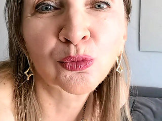 Busty hot granny teases and plays with her pussy