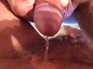 Pissing in & on Hairy Pussy