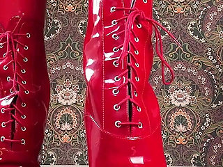 Red Ballet Boots on Wooden Floor