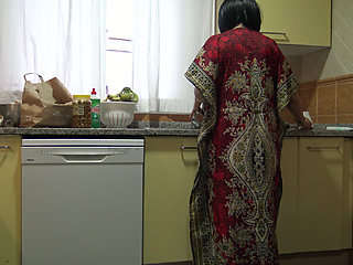Stepmother lets stepson cum inside her hairy pussy in the kitchen