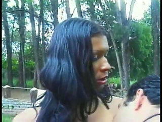Young sunburnt tranny Luciana in yellow bikini can't get enough cowboy's cock in her mouth and anus