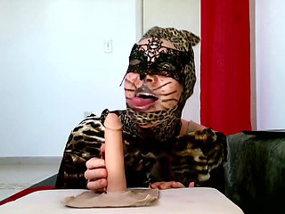Hungry CatWoman shows how to use tounge on dick