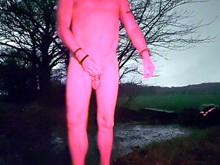 Wanking naked in the rain